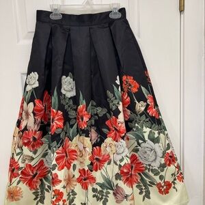 Chicwish Black-to-Cream Floral Circle Skirt with Red Accents